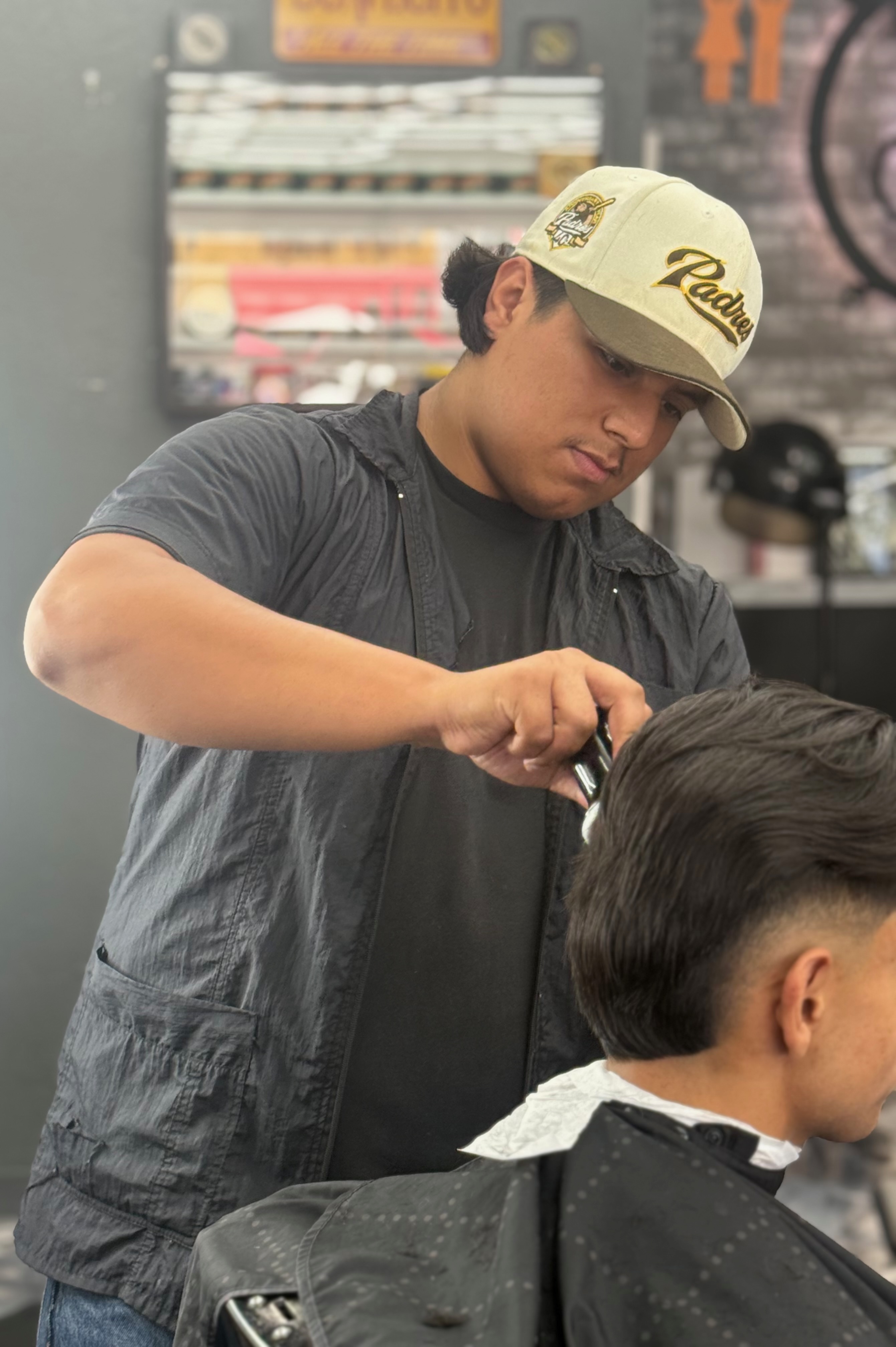 Joshua Cabral, barber at Defined Cuts