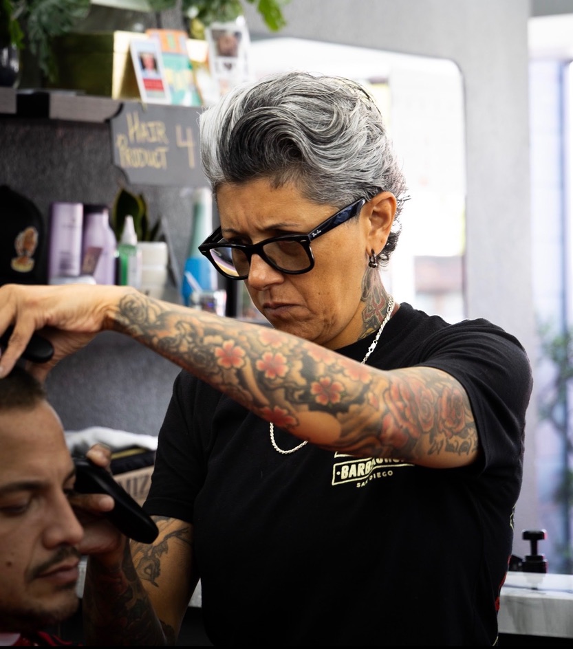 Lily Ortiz, barber at Defined Cuts